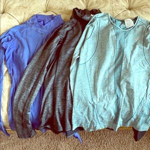 3 long sleeved workout tops.